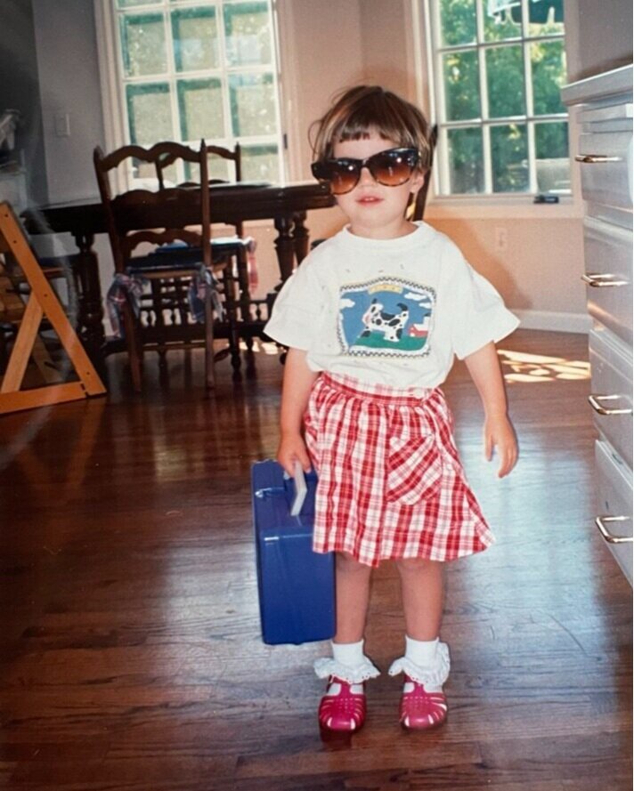 Young Claire in sunglasses